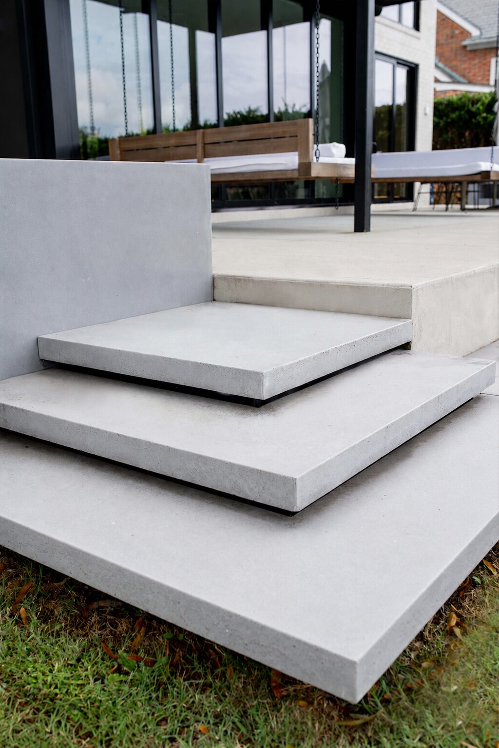 Floating precast concrete steps in a landscaped setting
