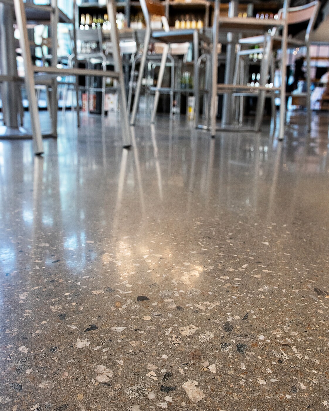 Concrete floor with visible tone and aggregate variation